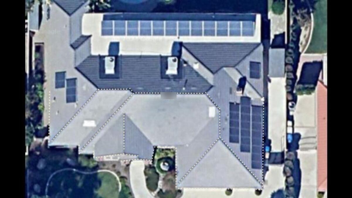 Aerial view of a Bakersfield home with every roofline run measured and traced for Christmas light installation