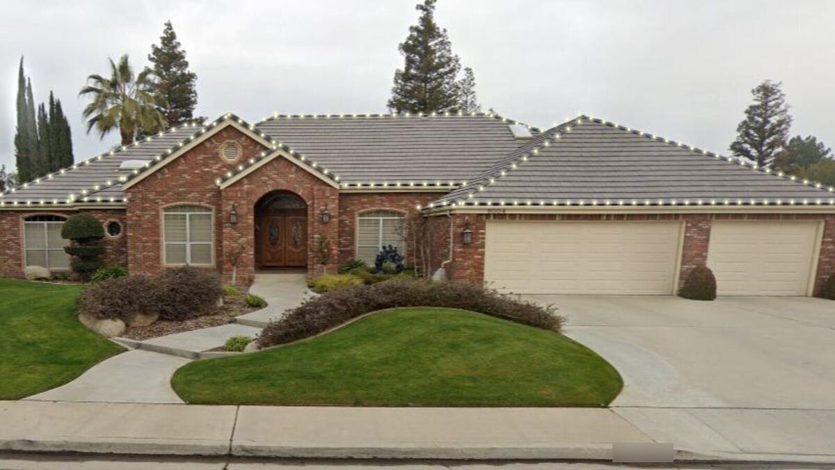 A Bakersfield home with warm white Christmas lights drawn along the rooflines in a Just Be Bright design preview
